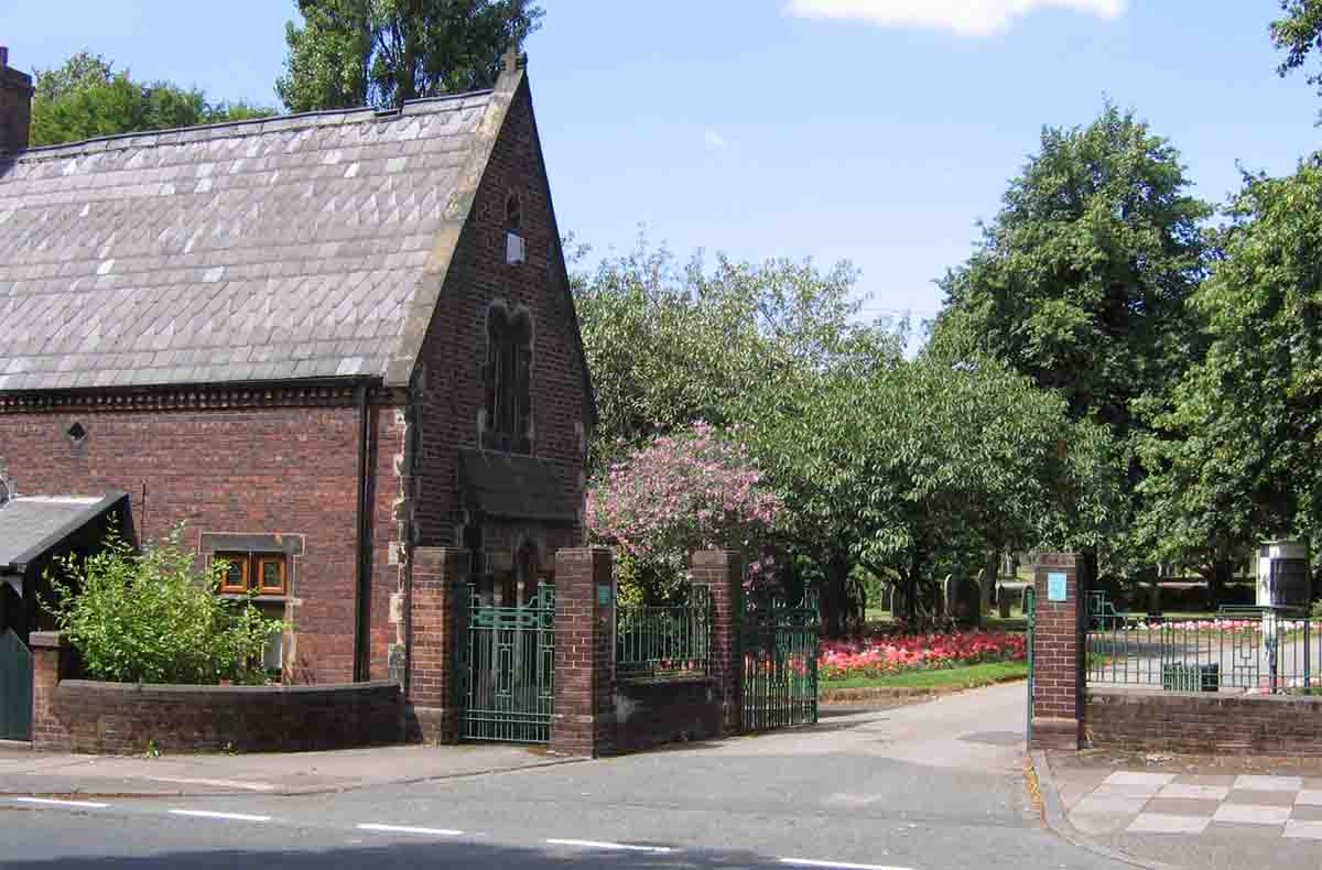 Atherton Cemetery gates on Leigh Road. The building was originally the Cemetery Keepers house. Photo by Peter Wood July 2005