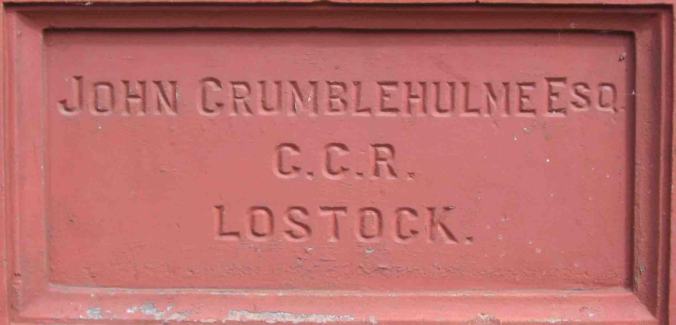 One of the chapel plaques. John Crumblehulme was from a family of Bolton iron founders. He baptised  a number of children at Atherton from 1890 on. Photo by Peter Wood, July 2005
