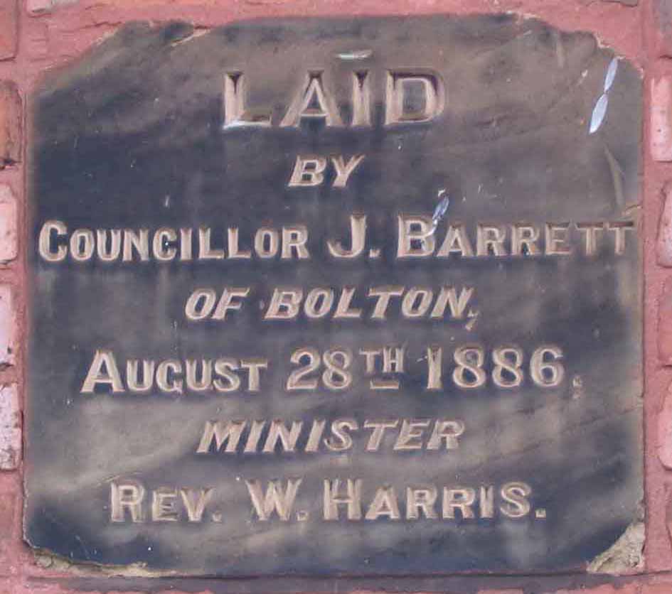 Plaque in the front wall of Alma Street chapel. John Barrett later became the Mayor of Bolton. Photo by Peter Wood, July 2005