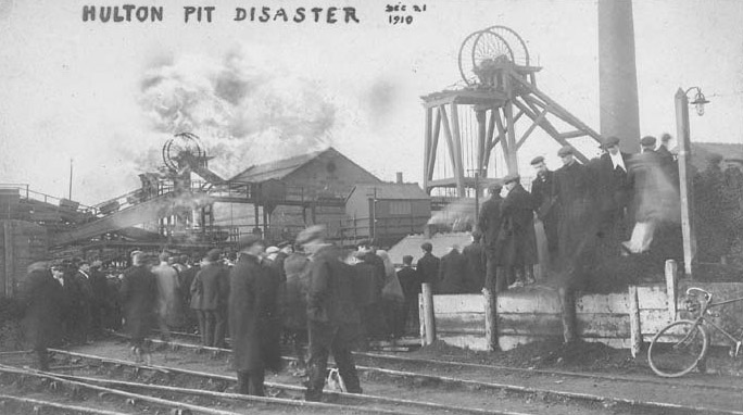 Crowds at the pit head on the day of the explosion. The headgear of No.3 Pit where the explosion occurred is the one with steam billowing around. Downcast shaft No.4 is in the foreground.