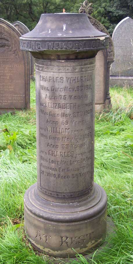 An unusual cylindrical monument for Charles Wharton in Deane St Mary churchyard. Photo by Pam Clarke, Sept. 2006