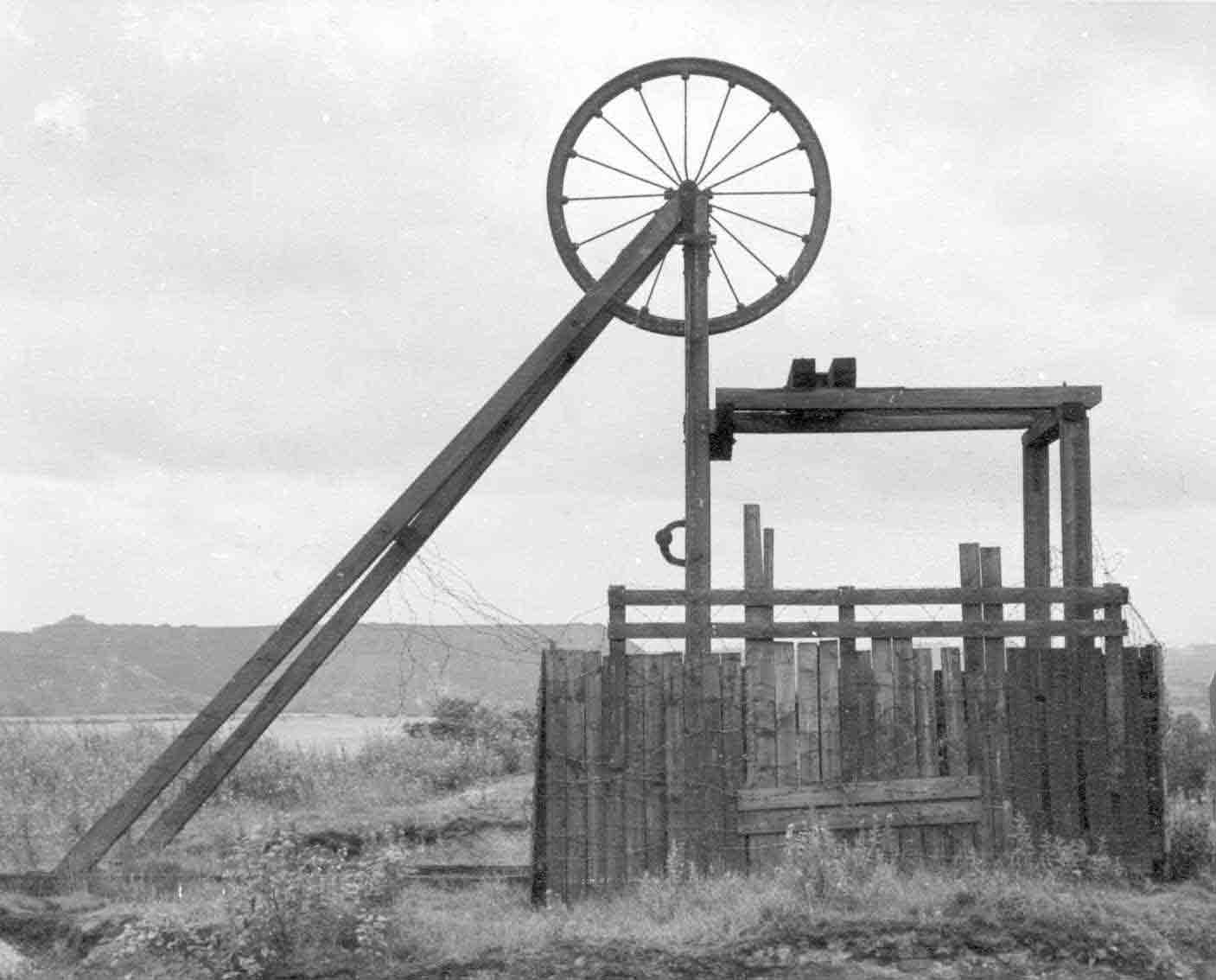 A relic of the 1870s, this small wooden head frame at Combermere on Shakerley survived into the 1960s. Photo by Peter Wood, 1963